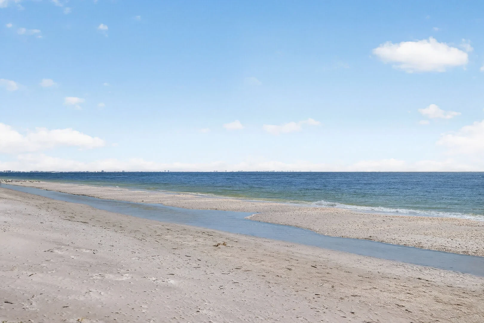 Sanibel beach facing Fort Myers