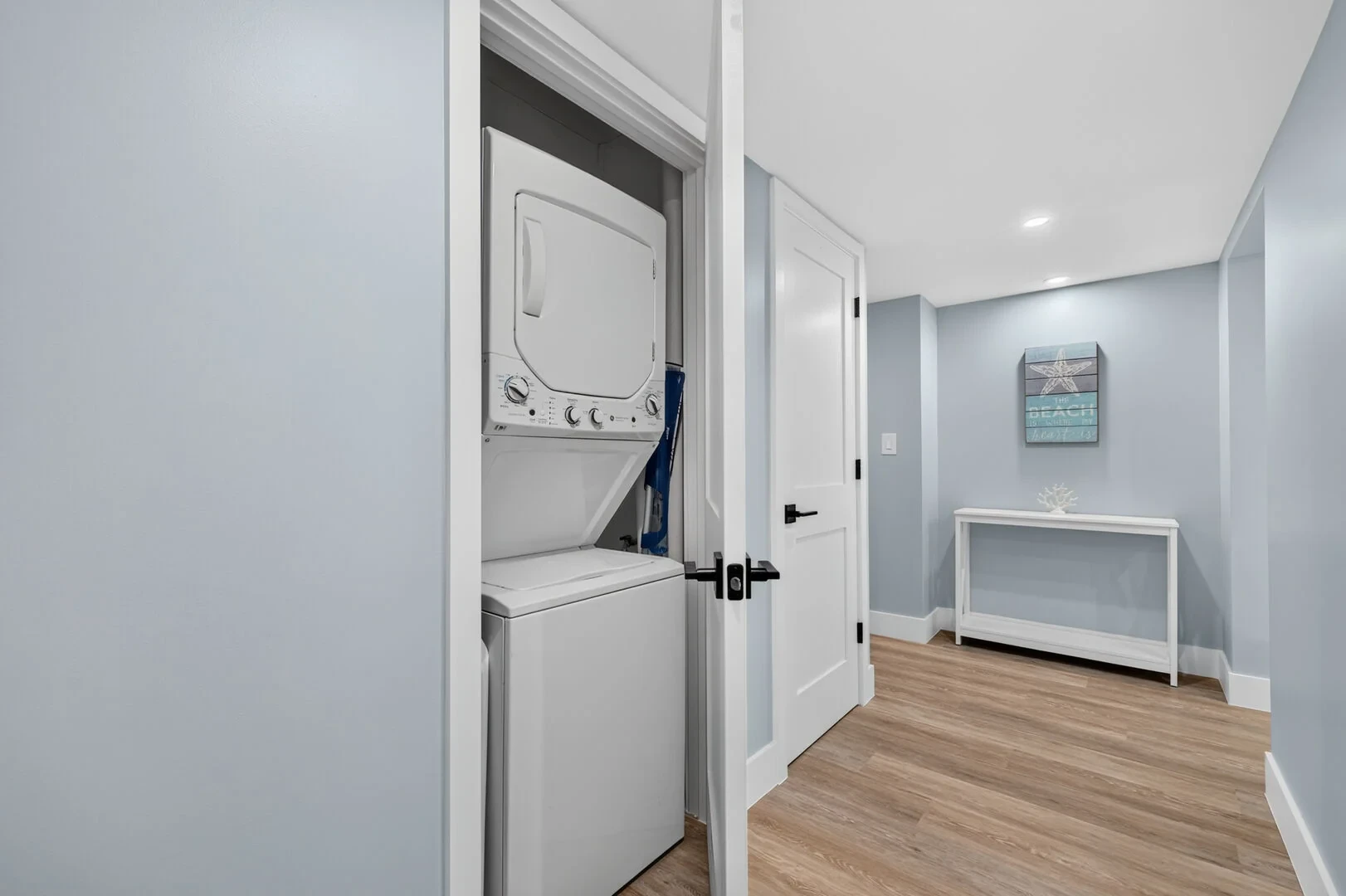 In-unit laundry with stacked washer and dryer