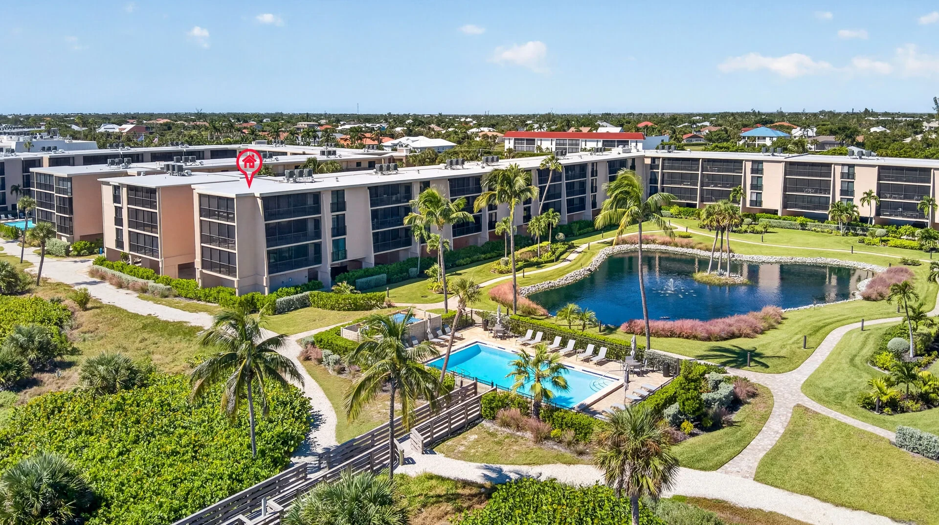 Aerial view of Sundial East with pool and lagoon